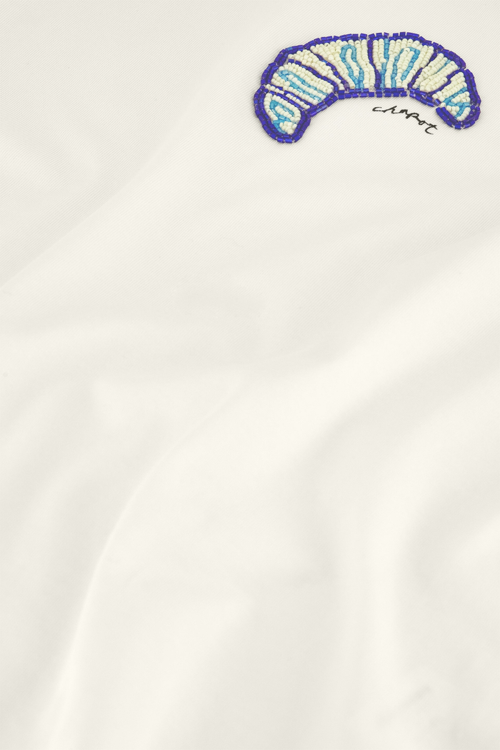 Fabienne Chapot Benja T-Shirt in Cosy White. 100% organic cotton with a relaxed loose fit β breathable everyday essential at Dotique.