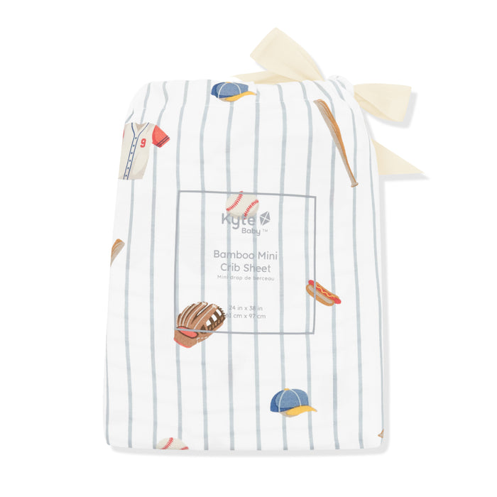 Mini Crib Sheet in Home Run shown in its packaging