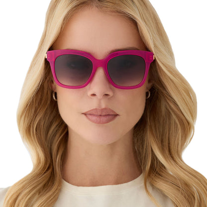 on model - female wearing diff eyewear featuring the bella square sunglasses with a bright tulip with gold frame and grey gradient lenses front view