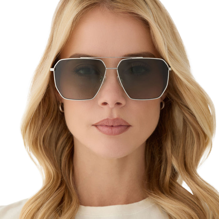 on model - blonde female wearing diff eyewear featuring the berkely navigator sunglasses with a silver frame and cool matcha gradient lenses front view
