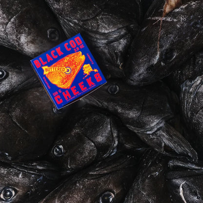 Black Cod on pile of black cod heads