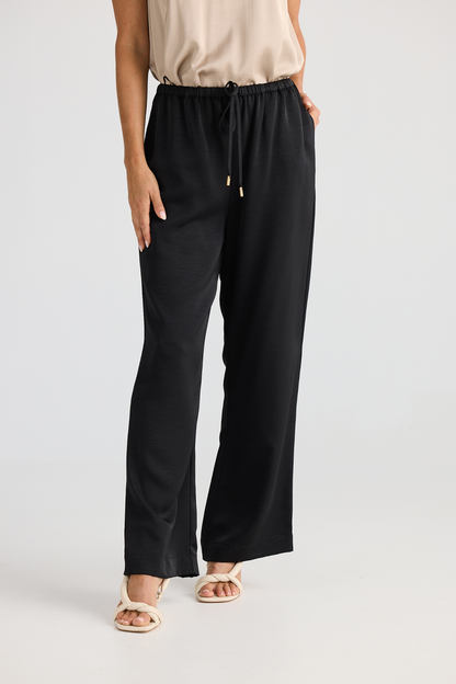 Dotique Brave + True BT25390 Boulevard Pant in black with relaxed straight-leg fit