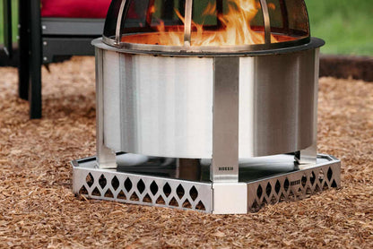 A Breeo X Series Firepit with a Base and Spark Screen