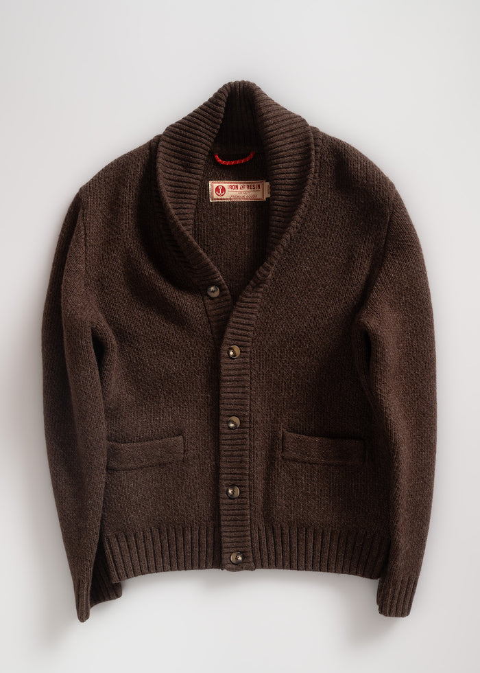 Brown cardigan with shawl collar and buttons, featuring Iron & Resin label. Cozy knit texture, laid flat on a white background.