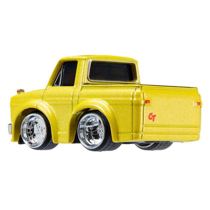 Yellow model truck with chrome wheels on a white background