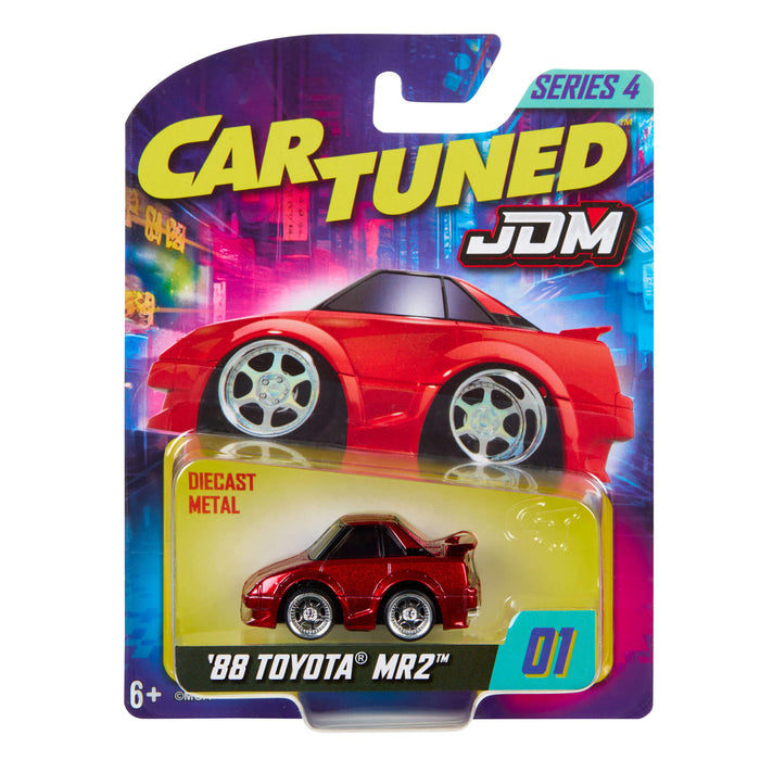 Red toy car in packaging with 'Car Tuned' and 'JDM' branding on a colorful background
