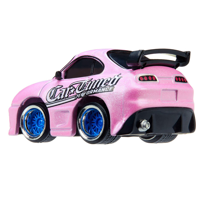 Pink toy car on a white background