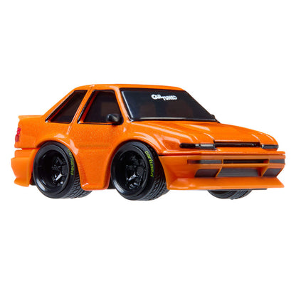 Orange model car on a white background