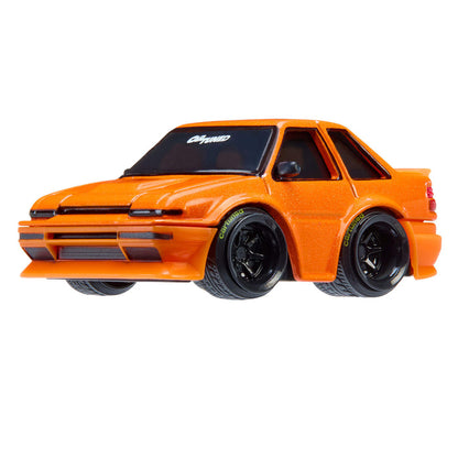 Orange model car on a white background