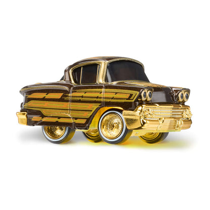 Gold and brown classic car model on a white background