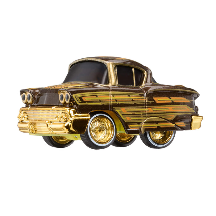 Gold and brown vintage car model on a white background