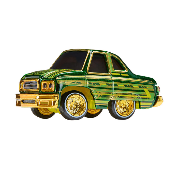 Green and gold car-shaped object on a white background