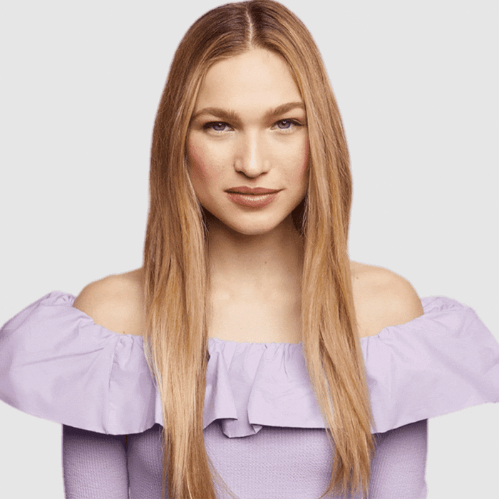 Woman with long styled waves created using the Chocolate XL Satin Heatless Curling Set.