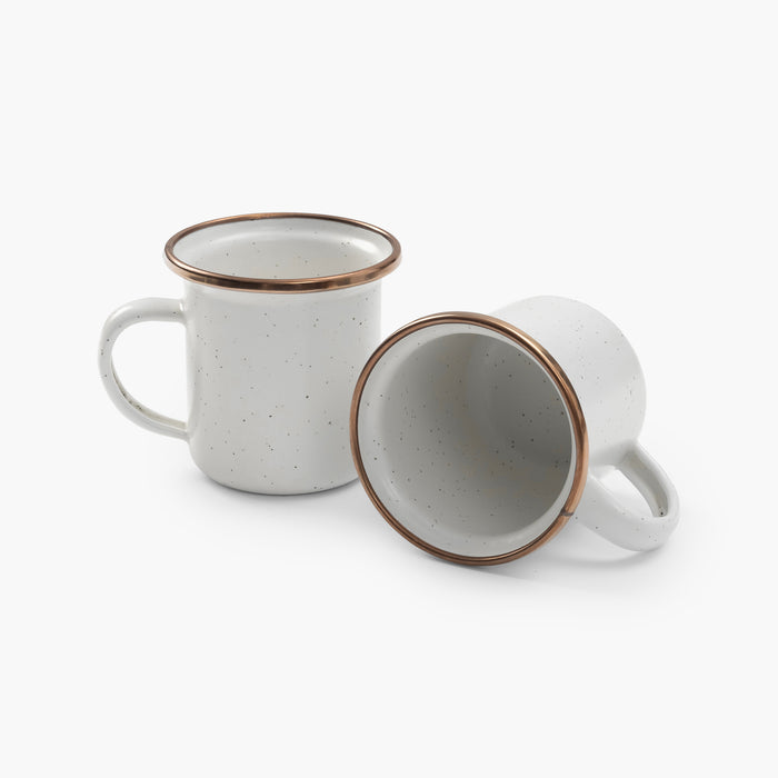 Two 5 oz speckled eggshell enamel espresso cups with copper plated rims on a white background.