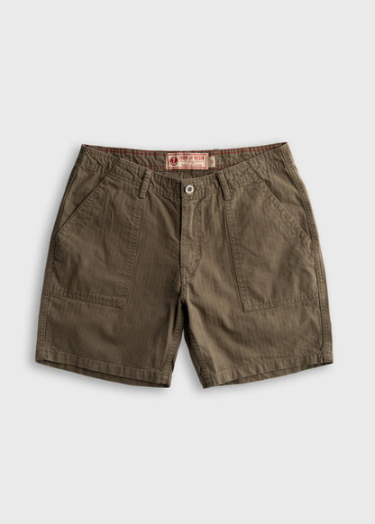 Olive green shorts with front pockets and button closure, labeled "Iron and Resin," displayed on a plain white background.