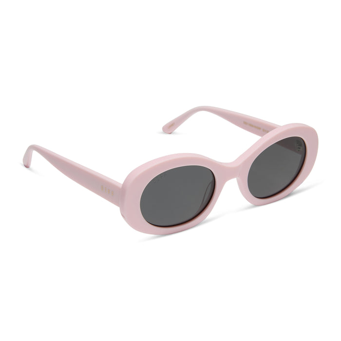 diff eyewear featuring the lainey oval sunglasses with a powder pink frame and grey polarized lenses angled view