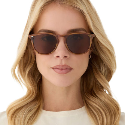 on model - female wearing diff eyewear featuring the maxwell xl square sunglasses with a longhorn brown frame and brown polarized lenses front view