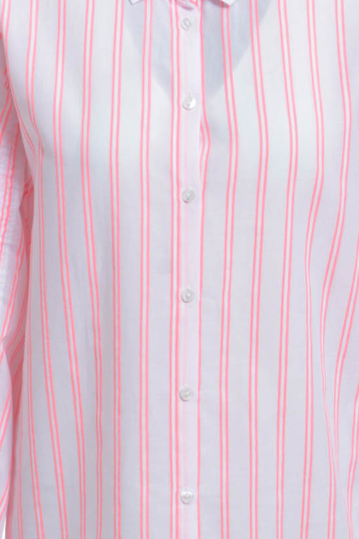 A fresh, lightweight shirt blouse from Milano Italy in a soft pink base with neon coral stripes. Shop now at Dotique.