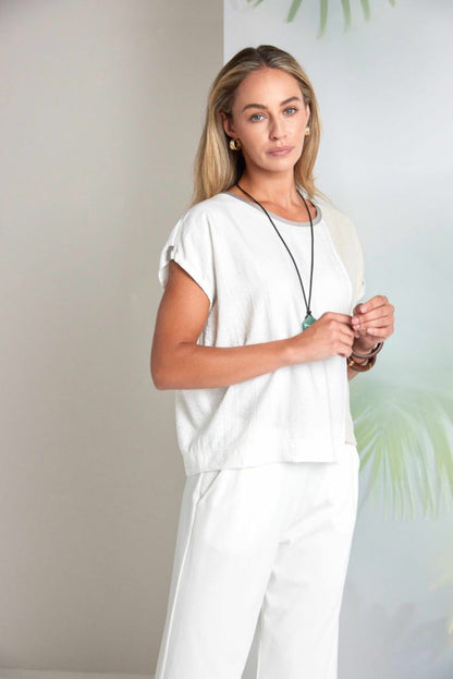 Woman wearing Naya NAS26237 White Wide Leg Pull-On Trousers by Naya, shop the vendor at Dotique for stylish essentials.