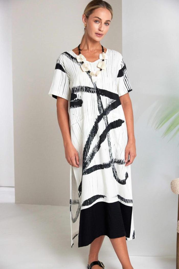 Naya NAS26320 Cream Black Brush Stroke Dress by Naya shown on model Shop Naya at Dotique for bold artistic style