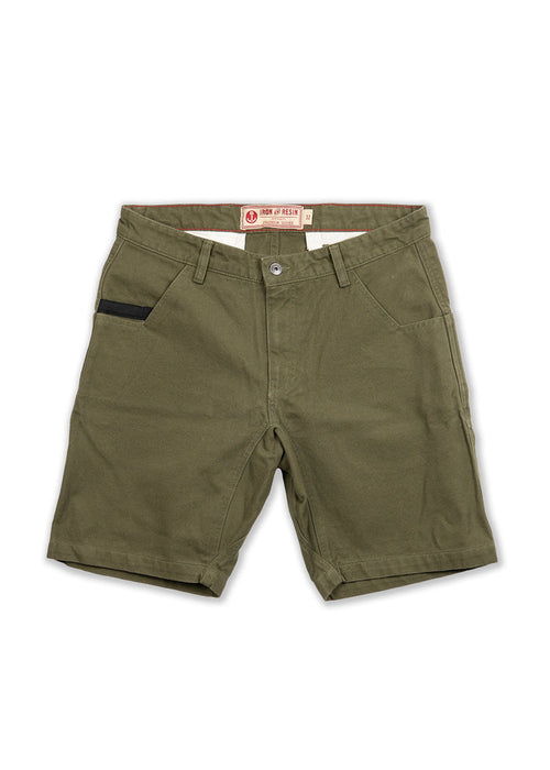 Green Iron & Resin shorts with front pockets and a black accent on the left. Button closure and belt loops are visible.