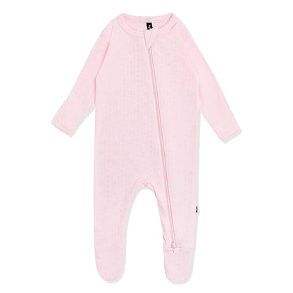 Pointelle Zippered Footie in Sakura showing the picot trim on a white surface