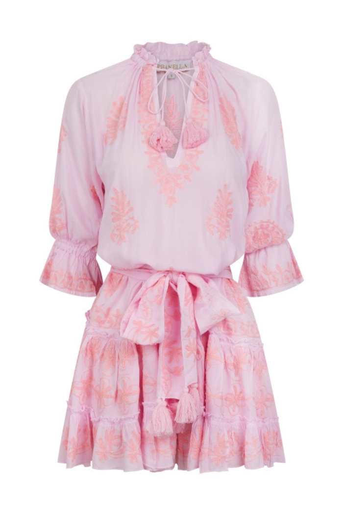 Discover the Pranella Sia Pink Dress — a lightweight, flattering style in a soft pink hue, perfect for sunny days and everyday dressing. Shop at Dotique.