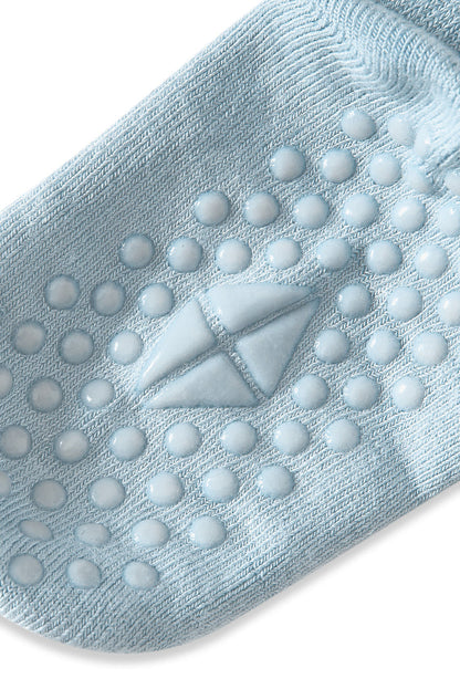 Angled bottom of Kyte sock with grips.