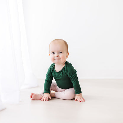 Infant Wearing Kyte Baby Ribbed Leggings with Elastic Waist in Blush