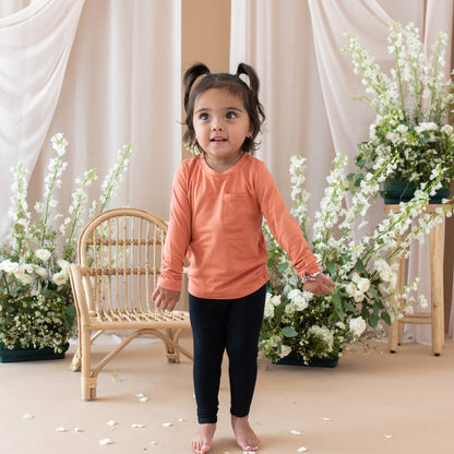 Toddler wearing Kyte Baby Ribbed Leggings in Midnight