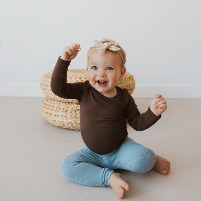 Infant Wearing Kyte Baby Ribbed Leggings in Slate