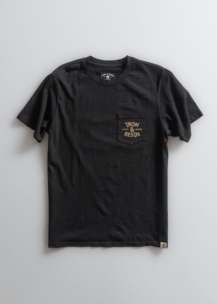 Black T-shirt with "Iron & Resin" logo on chest pocket, displayed on a light background. Simple, casual design.
