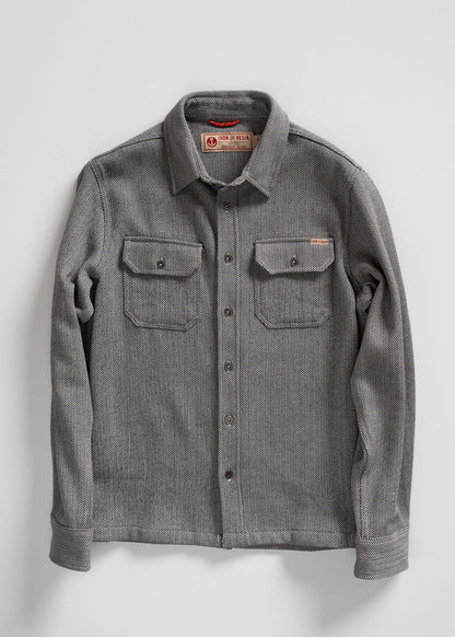 Gray herringbone button-up shirt with two chest pockets, displayed on a white background. Iron & Resin label visible inside.