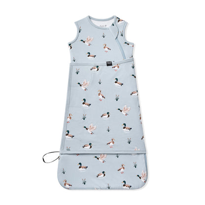 Sleep Bag Swaddler in Mallard Duck 0.5 shown swaddled on a white surface