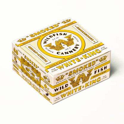Vintage-style packaging box with 'Wildfish Cannery' branding on a white background