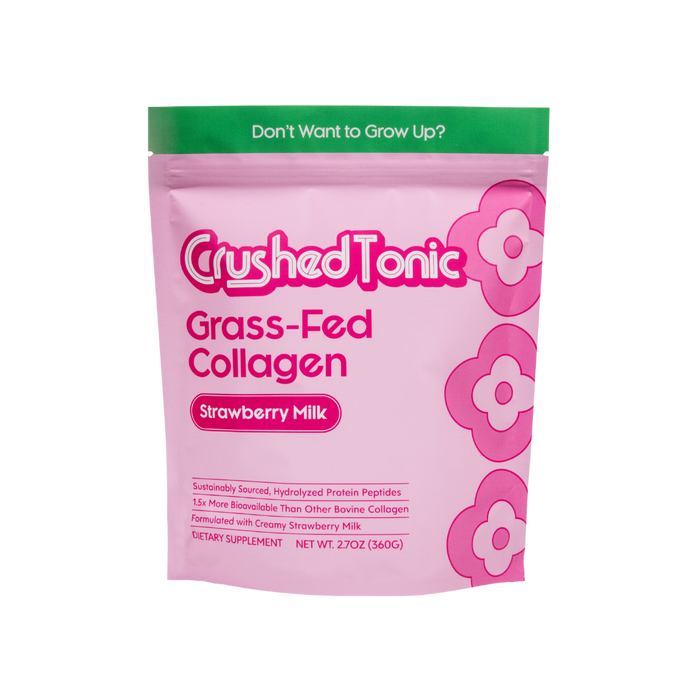 Pink package of Crushed Tonic Grass-Fed Collagen Strawberry Milk flavor on a white background