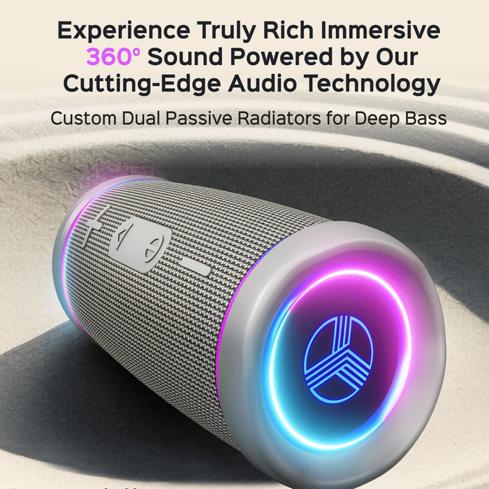 Portable speaker with neon lights on a textured surface, highlighting audio technology features.