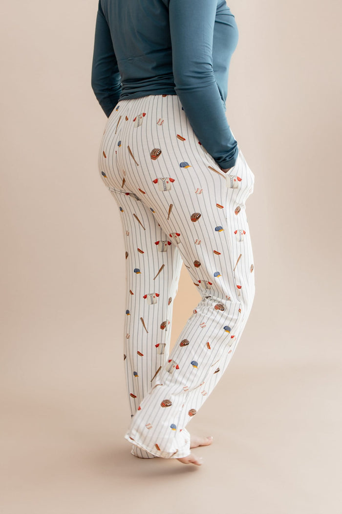 Side and back view of the Women's Lounge Pants in Home Run shown on a female model
