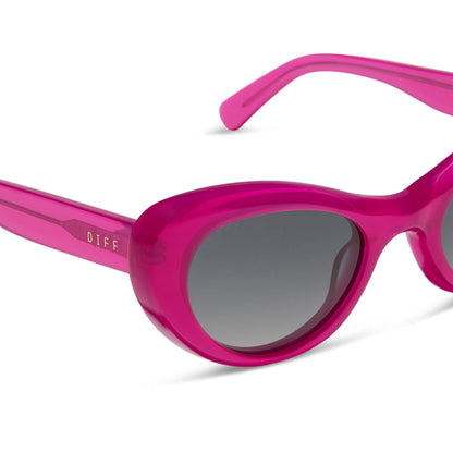 diff eyewear featuring the zaria cat eye sunglasses with a bright tulip pink frame and grey gradient polarized lenses detailed view