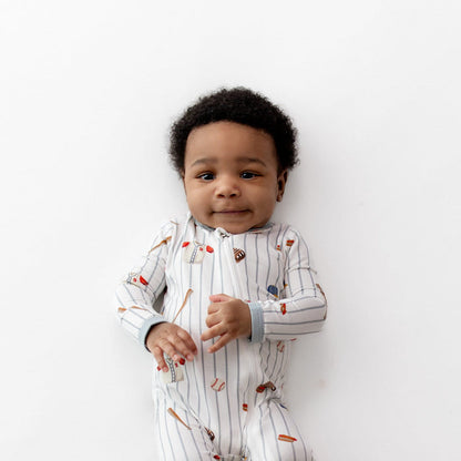 Close up of the Zippered Romper in Home Run shown on an infant