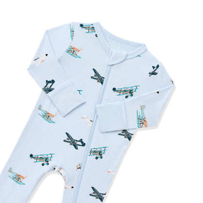 Close up of zipper garage and fold over hand cuffs on the Zippered Romper in Take Off